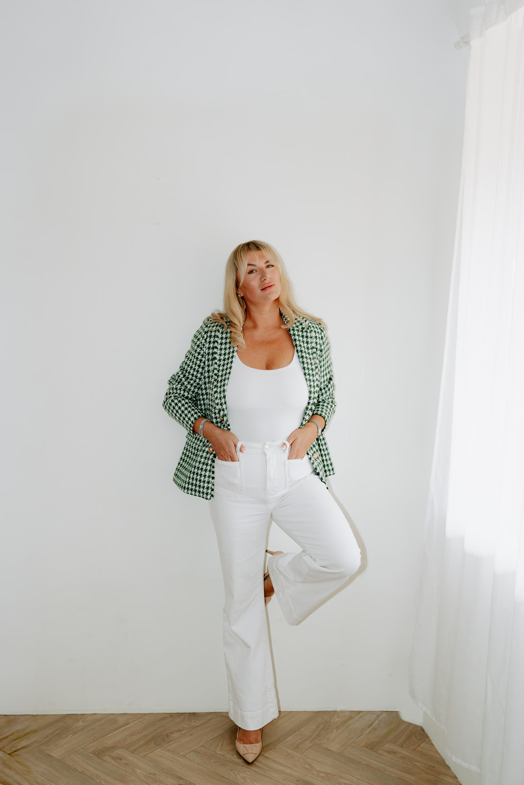 Portrait of Robyn in green and white