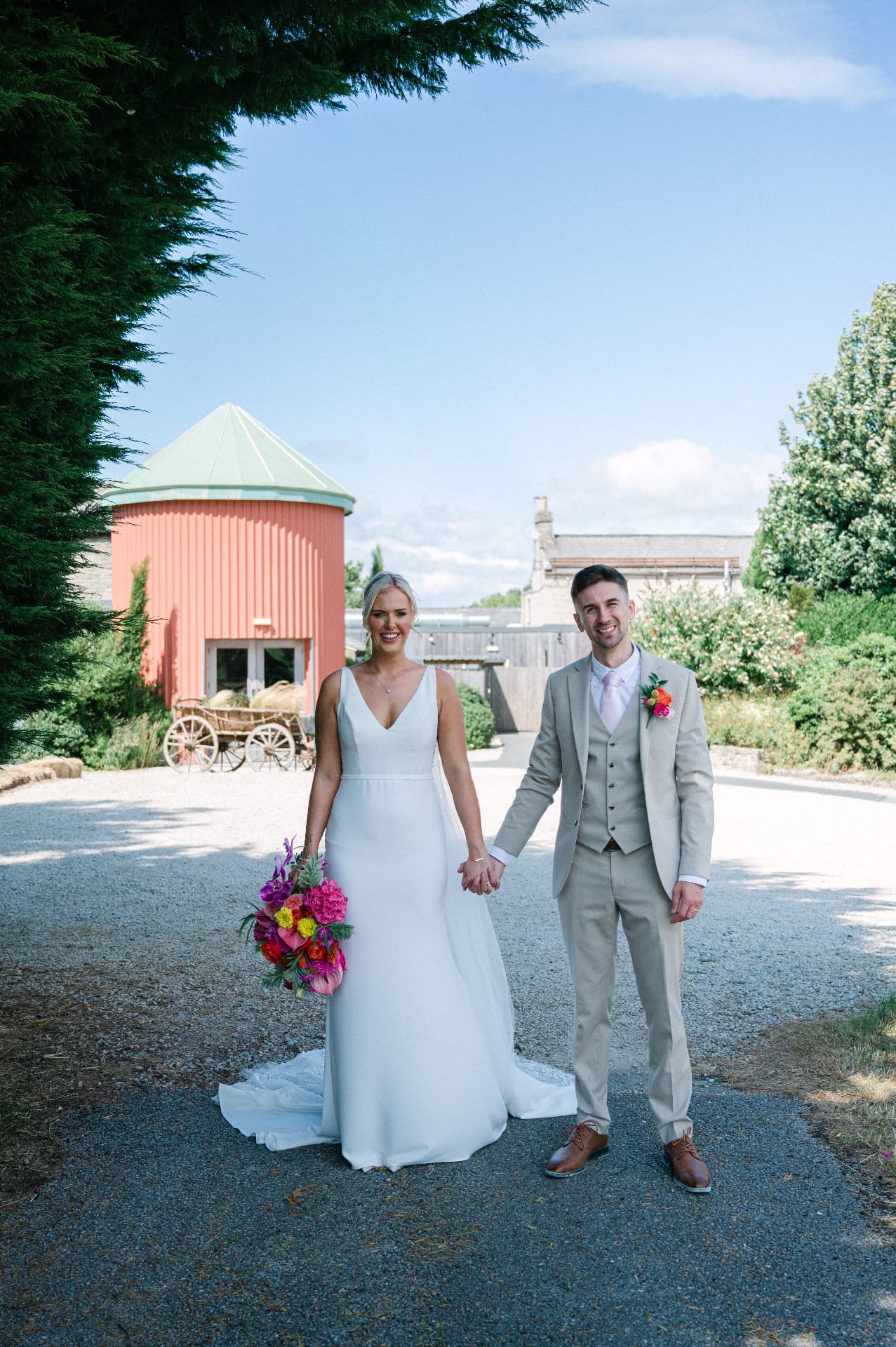 Bride and groom on the estate path at their Yorkshire wedding
